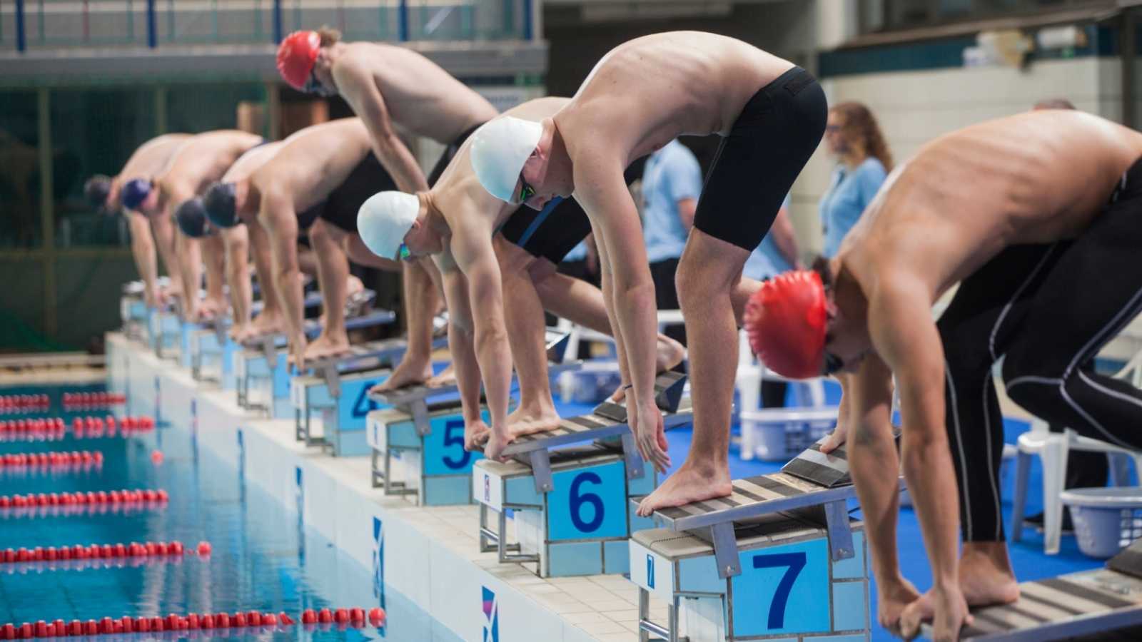 Competitive swimmer preparing for a race